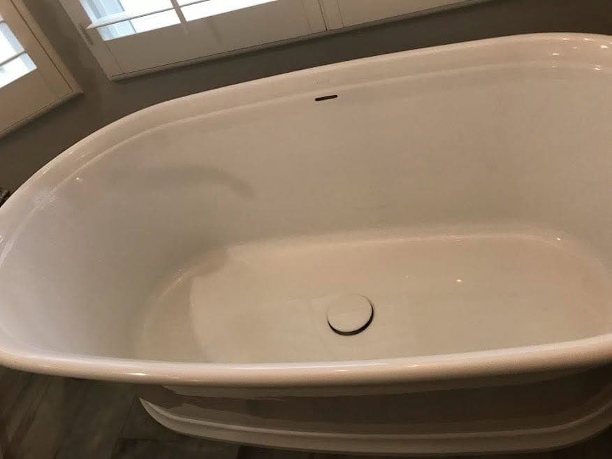 A freestanding bathtub cleaned and detailed by Warriors of the Order