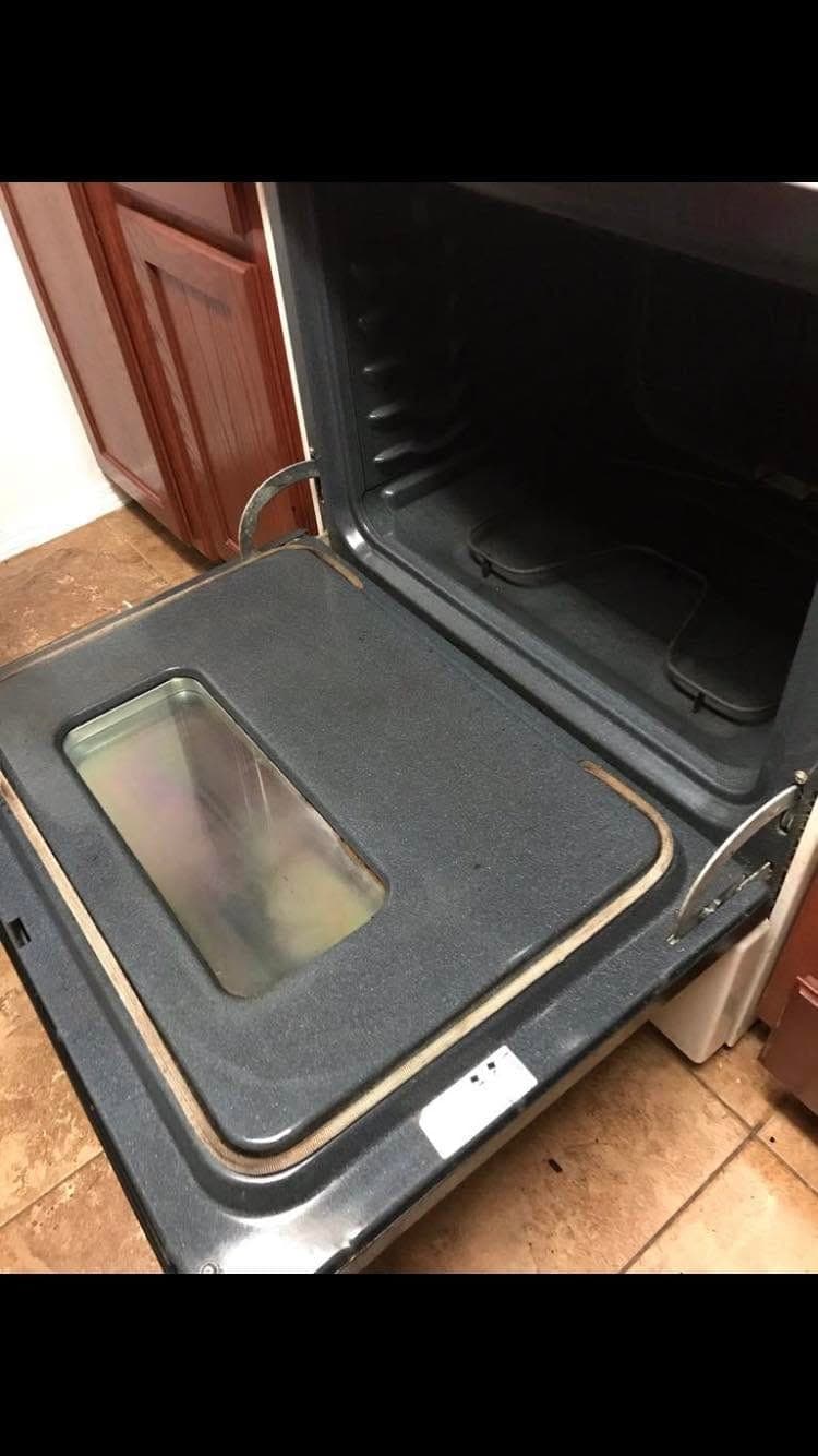 An oven cleaned inside during a Warriors of the Order kitchen deep clean